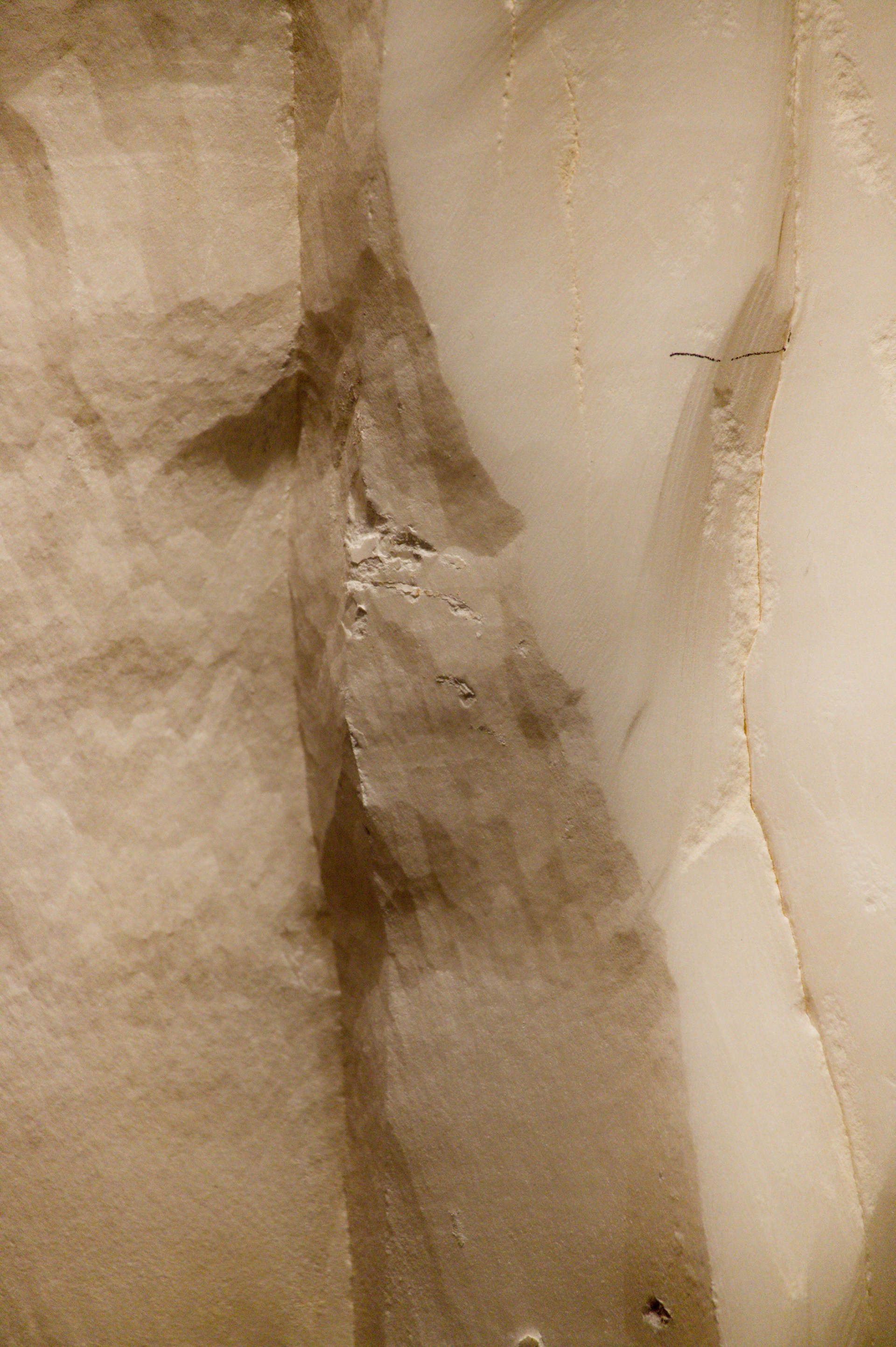 Translucent layered white-and-beige stone — quiet abstract texture.